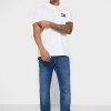Polówka polo Tommy Jeans męska biała Slim Fit bawełniana